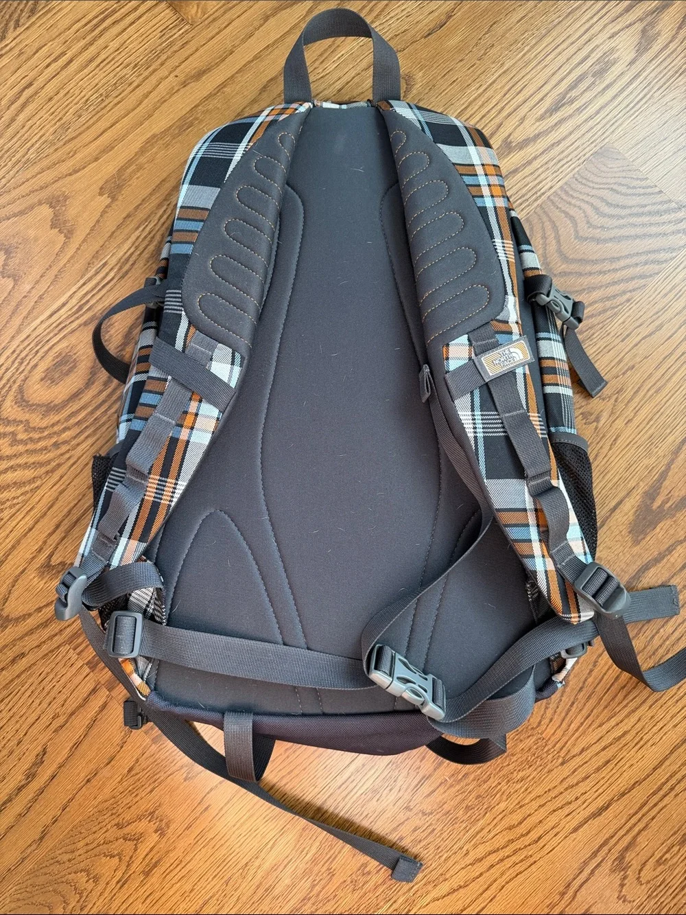 The North Face Plaid Backpack in Black, Orange & Gray